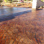 Stained Concrete On Stone Paver Driveway
